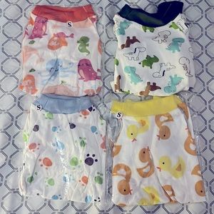 4 puppy/dog pajamas & 1 t-shirt.